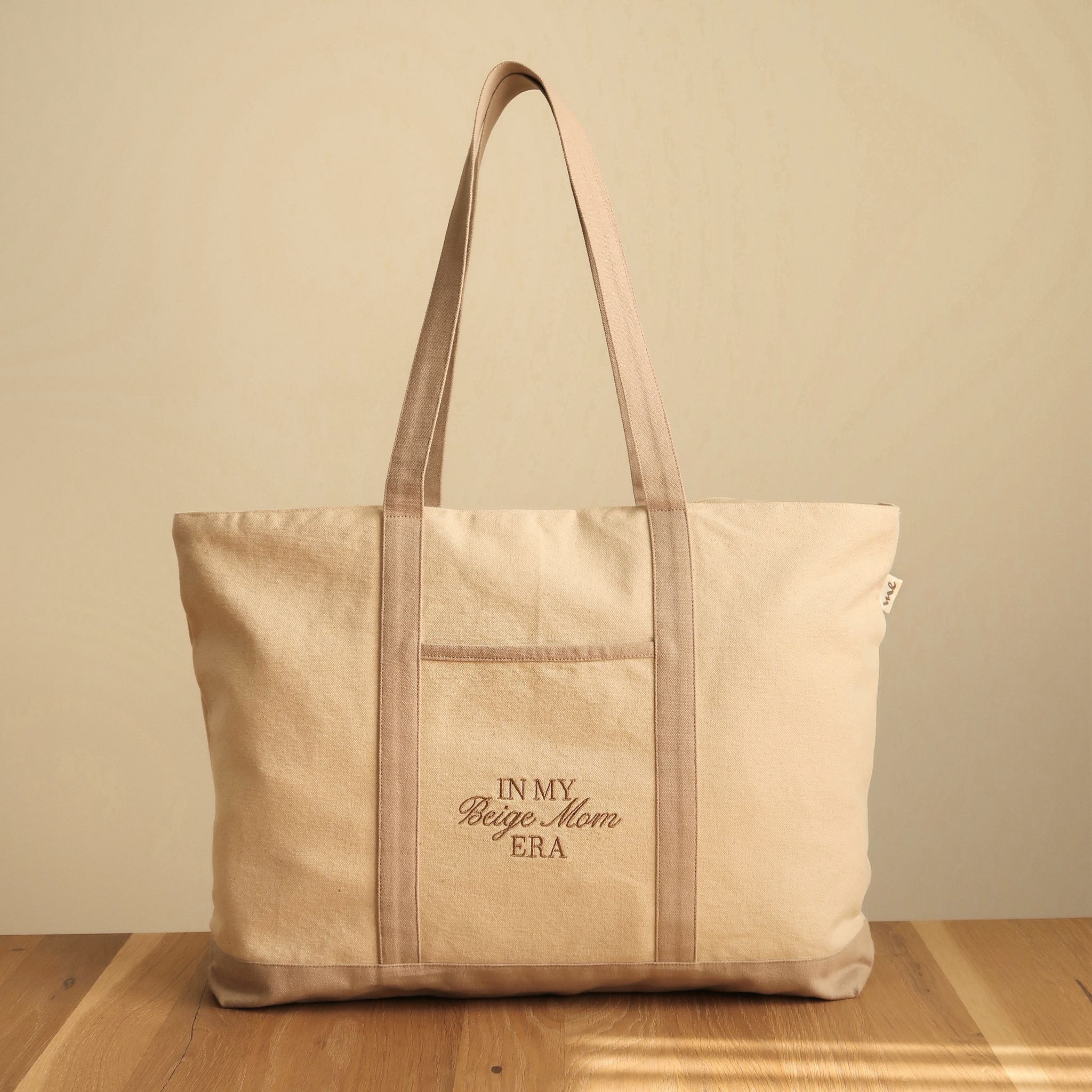 IN MY BEIGE MOM ERA BAG